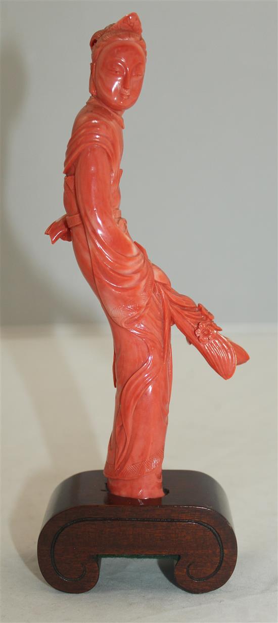A Chinese coral figure of a beautiful lady, 20cm incl. wood stand